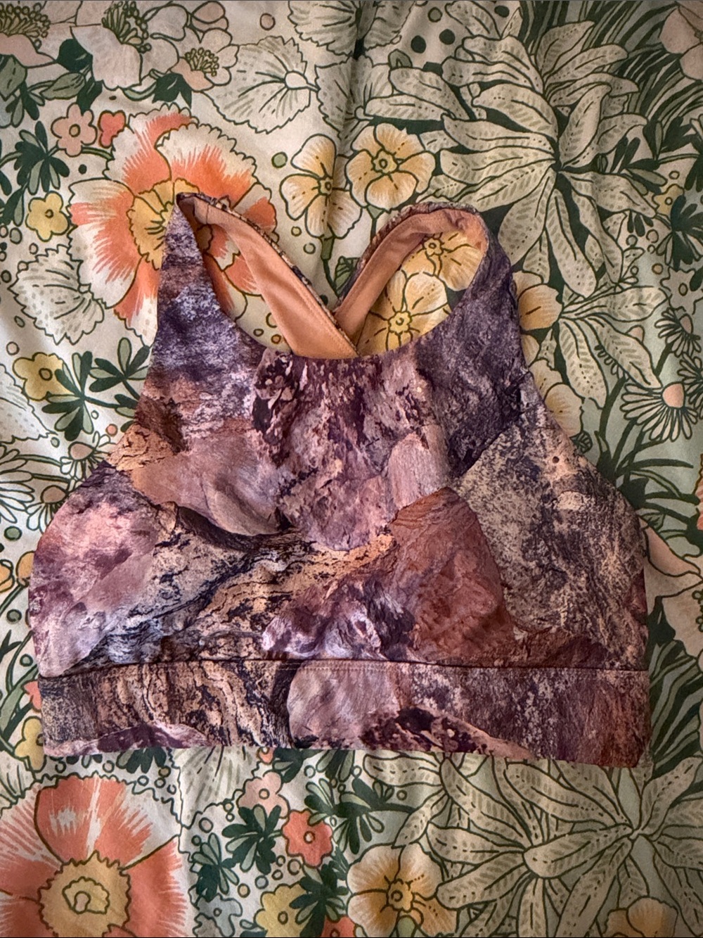 Fabletics Marble Print High-Neck Sports Bra in Pink and Purple